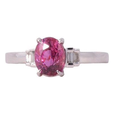 Lot 47 - A pink sapphire and diamond ring.