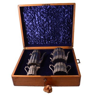 Lot 194 - Victorian silver four piece teaset in presentation box