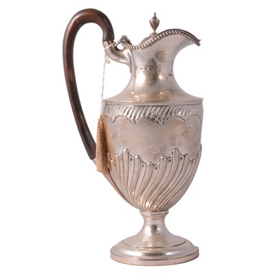 Lot 207 - A Victorian silver ewer shaped hot water jug, Charles Stuart Harris, London 1894