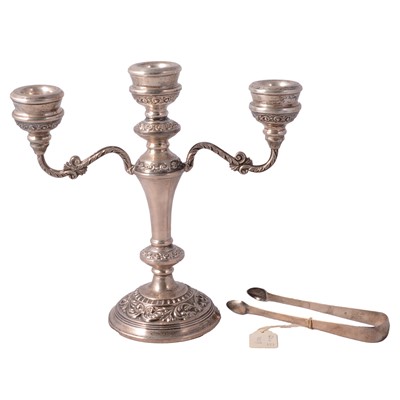 Lot 210 - A silver three light candelabra, and pair of Georgian sugar tongs.