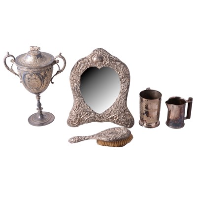 Lot 114 - A silver framed bevelled glass dressing table mirror, plated livestock trophy, milk and sugar, lighter.