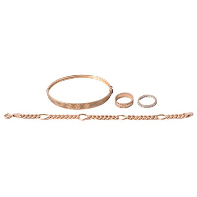 Lot 159 - A 9 carat gold bangle bracelet, two rings.
