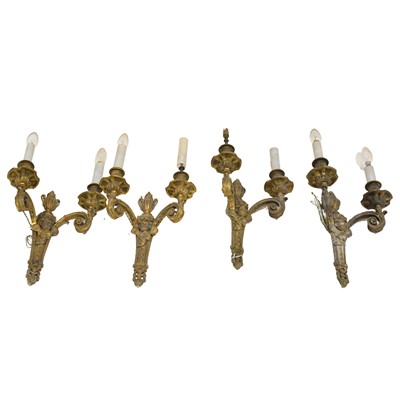 Lot 137 - Set of four cast and gilt metal twin branch wall lights