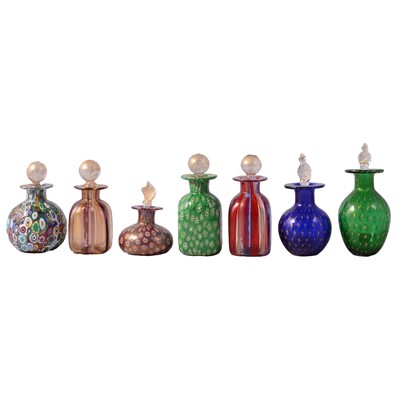 Lot 34 - Seven Murano glass scent bottles with stoppers.