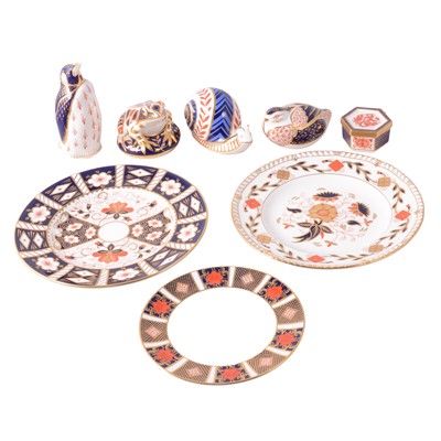 Lot 15 - Four Royal Crown Derby paperweights, trinket box and plates.