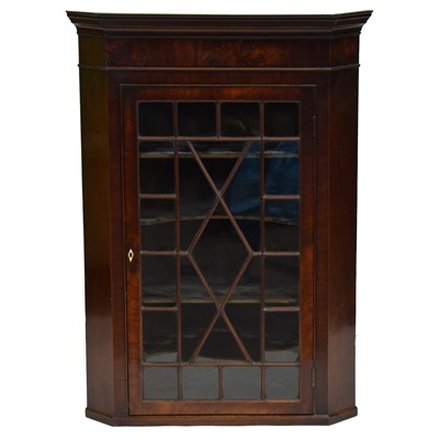 Lot 199 - George III mahogany hanging corner cabinet