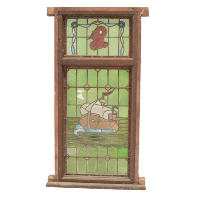 Lot 378 - Stained glass window with a galleon and Knight's helmet