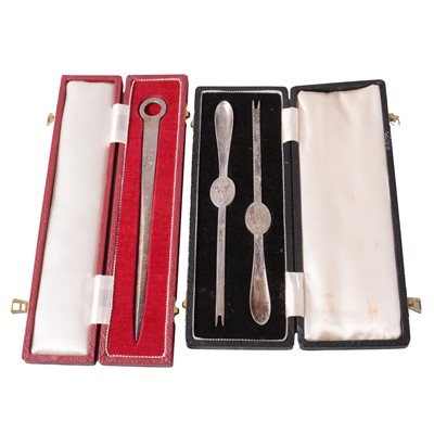 Lot 237 - A cased pair of lobster picks and cased skewer paperknife.