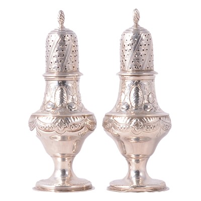 Lot 243 - A pair of Victorian small silver casters, Birmingham 1891.
