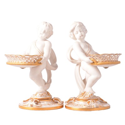 Lot 31 - Pair of Parian ware figural sweetmeat baskets
