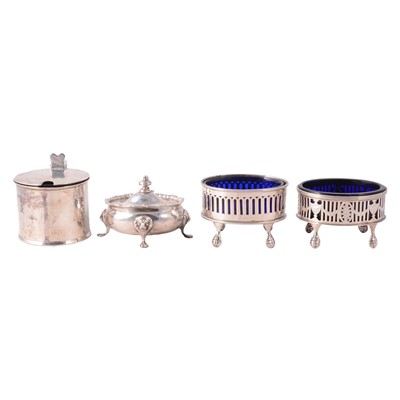 Lot 247 - Two silver mustard pots with blue glass liners, and two silver salts