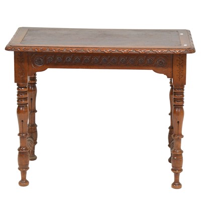 Lot 459 - Victorian carved walnut writing table