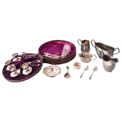 Lot 249 - A collection of silver and plated wares, small dish, spoons, plated egg cups on fitted box.