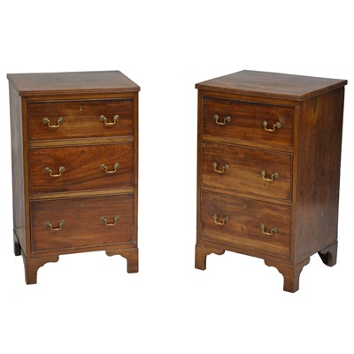 Lot 348 - Pair of mahogany three-drawer bedside pedestals