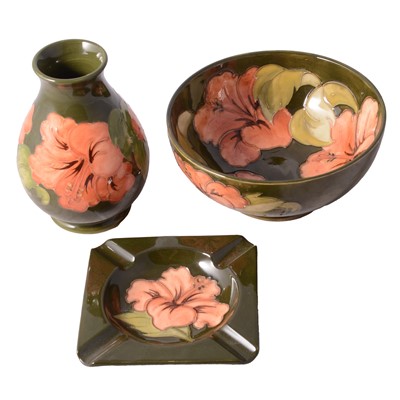 Lot 4 - Moorcroft Pottery, three pieces of Coral Hibiscus pattern