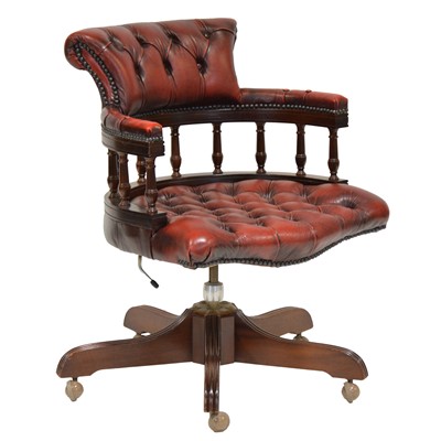 Lot 467 - Mahogany and leather captain's style office chair