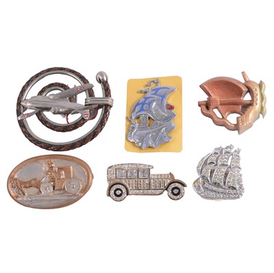Lot 497 - A collection of vintage transport related brooches and dress clips.