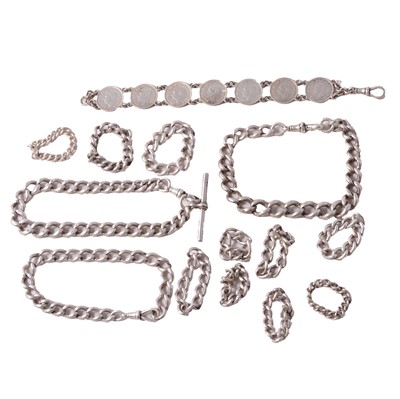 Lot 434 - A collection of silver bracelets and rings, mostly made from Albert watch chains.