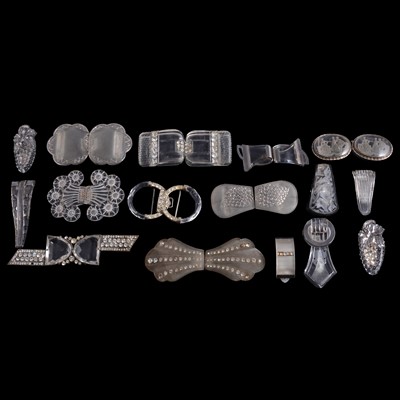 Lot 519 - Nine early 20th century glass two part buckles, and seven dress clips.