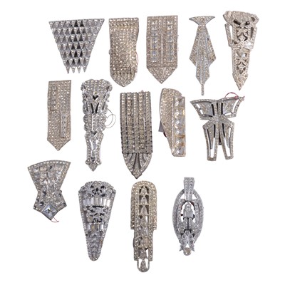 Lot 504 - Fourteen Art Deco large paste set single dress clips.