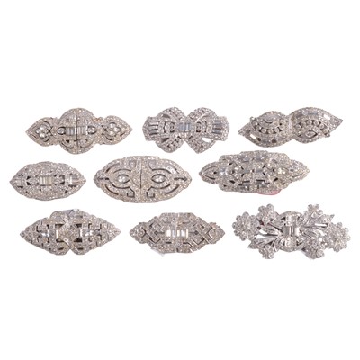 Lot 505 - Nine clear paste duette dress clips with brooch fittings, 50mm to 60mm