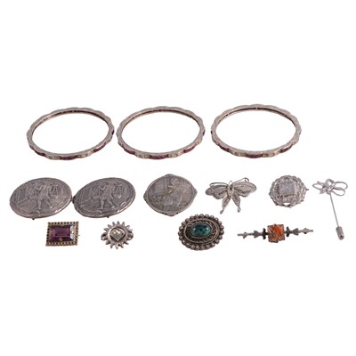 Lot 442 - Vintage white metal jewellery, three slave bangles, buckle, brooches .