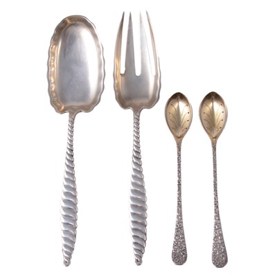 Lot 213 - Tiffany - a pair of white metal spoons with gilded pierced bowls, pair of Sterling salad servers.