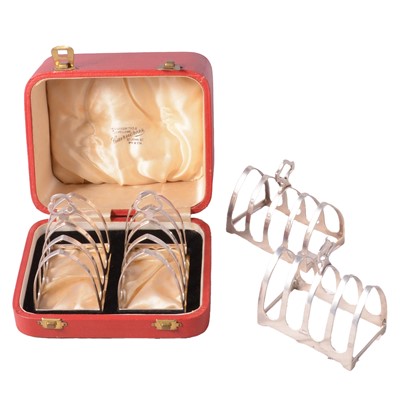 Lot 211 - Two pairs of silver toast racks