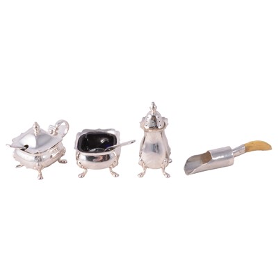 Lot 240 - A cased set of mother-of-pearl handled dessert knives and forks, Scottish sugar shovel and plated cruet.