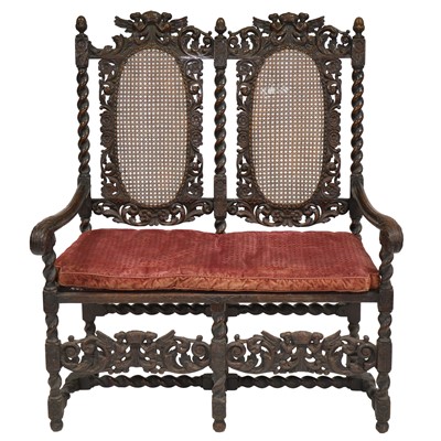 Lot 384 - Jacobean style carved walnut and cane-work bench