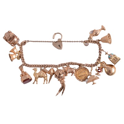 Lot 180 - A 9 carat yellow gold charm bracelet with charms.