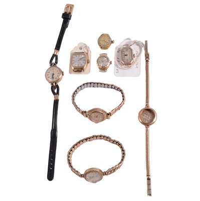 Lot 1080 - Seven ladies' 9 carat yellow gold manual wind wristwatches.