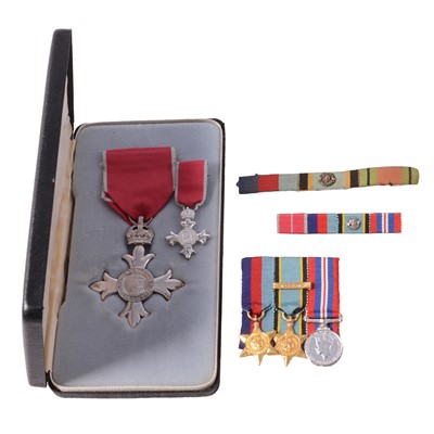 Lot 174 - A George VI MBE medal, and set of three WWII miniatures on bar