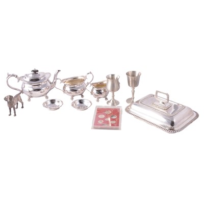 Lot 99 - A silver-plated entree dish, teaset, pair of Churchill pin trays, model of a dog, Franklin Mint coin set.