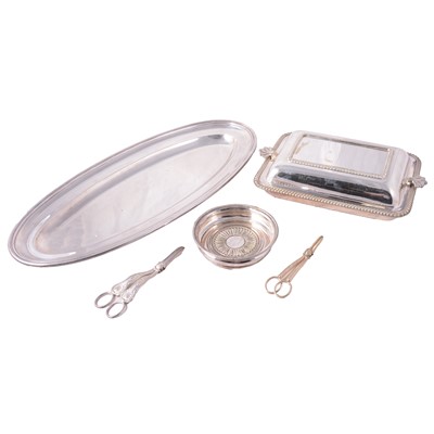 Lot 100 - A silver-plated fish platter, entree dish, bottle coaster, two pairs of grape scissors.