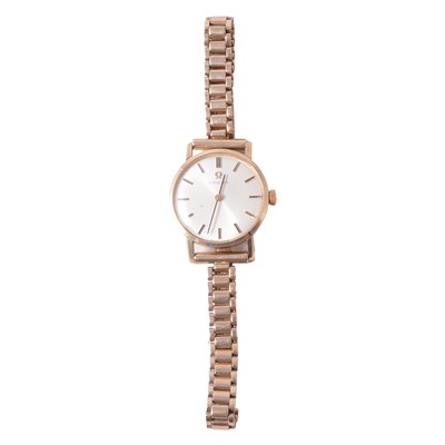Lot 1062 - Omega - a lady's 9 carat yellow gold manual wind bracelet wristwatch.