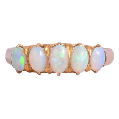 Lot 27 - An opal five stone ring and heart shaped pendant.