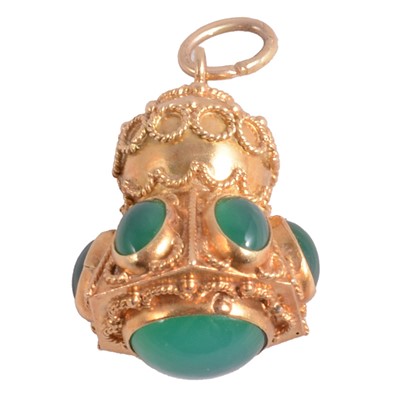Lot 266 - An Italian Etruscan revival charm/pendant, circa 1970's, set with green chalcedony.
