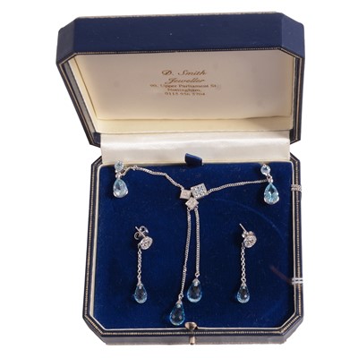 Lot 260 - Blue topaz pendant and two pairs of earrings