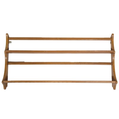 Lot 484 - Two Ercol elm wall shelves