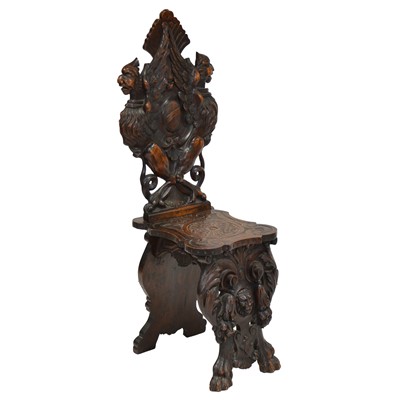 Lot 221 - Italian carved walnut Sgabello chair