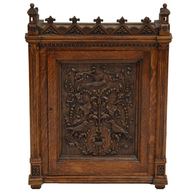 Lot 238 - Oak wall cupboard with carved panel door