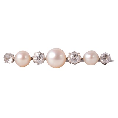 Lot 223 - A diamond and pearl bar brooch.