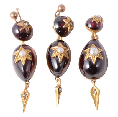 Lot 331 - A pair of garnet coloured earrings and similar pendant.