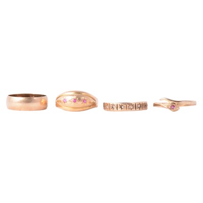 Lot 146 - Four gold rings, a snake ring, wedding ring and two others.