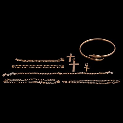 Lot 167 - A snake bangle, three crosses and five bracelets.