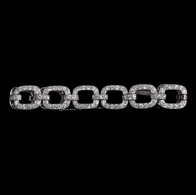 Lot 209 - A diamond set link bracelet.