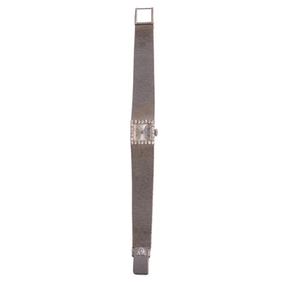 Lot 1064 - Juvenia - a lady's 18 carat white gold diamond set bracelet wristwatch.