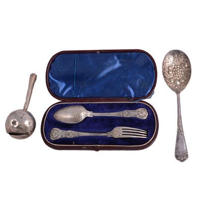 Lot 104 - A cased silver christening fork and spoon, rattle and plated berry spoon.