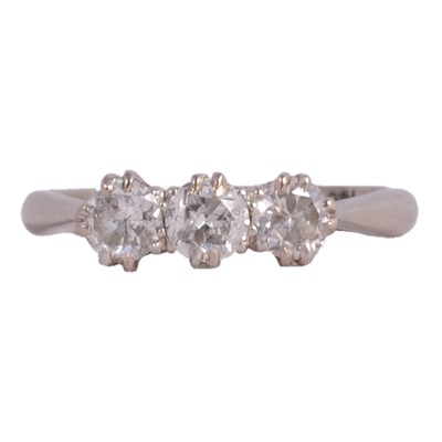 Lot 76 - A diamond three stone ring.